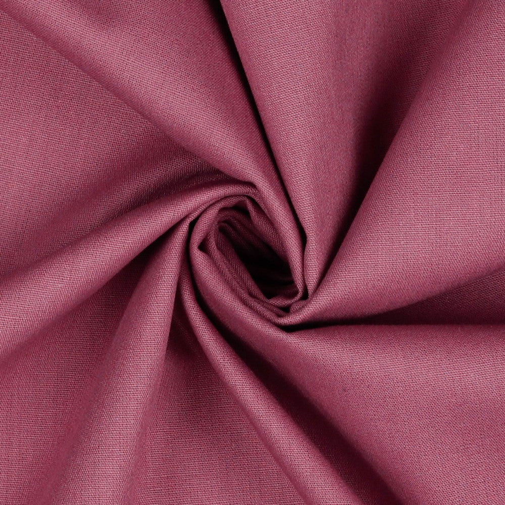Hochwertige Baumwollpopeline in Mauve - eleganter Stoff auf einem Schneiderpuppe drapiert.