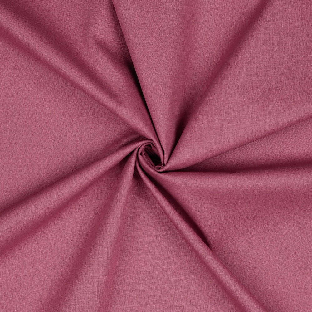 Hochwertige Baumwollpopeline in Mauve - eleganter Stoff auf einem Schneiderpuppe drapiert.