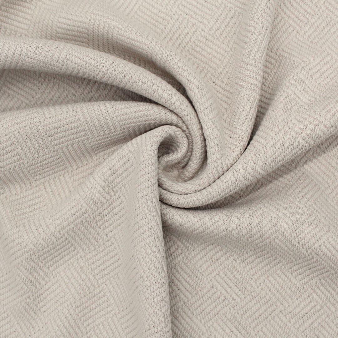 Vielseitiger Baumwolljacquard-Stoff in Sand mit zartem Muster – ideal für elegante Kleider und Röcke.