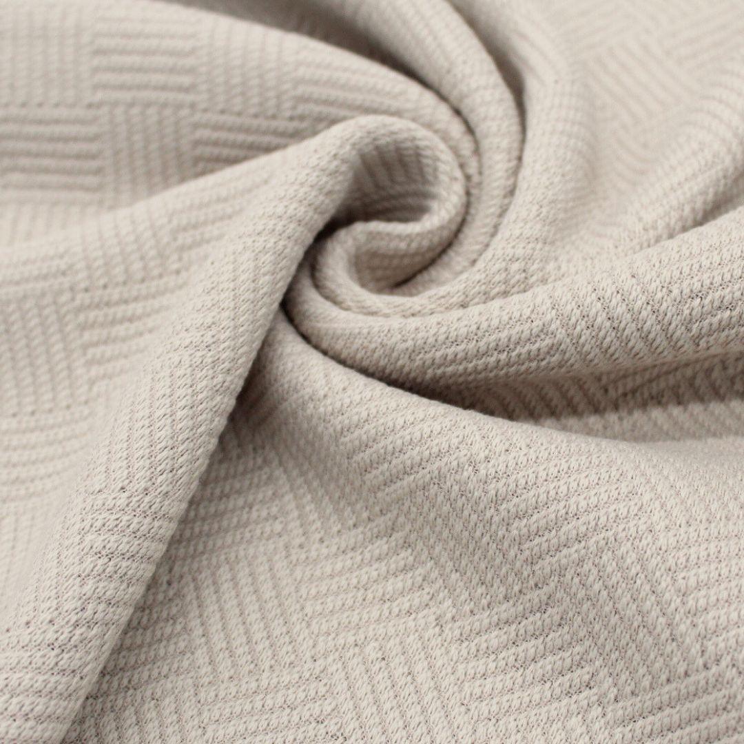 Baumwoll-Jacquard in Sand – Weicher Stoff mit leichter Elastizität, perfekt für bequeme Hosen und Accessoires.