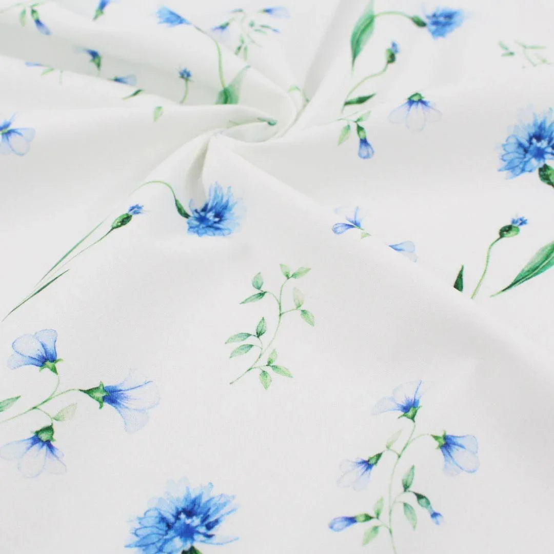 Baumwollstoff blaue Kornblumen auf Ecru