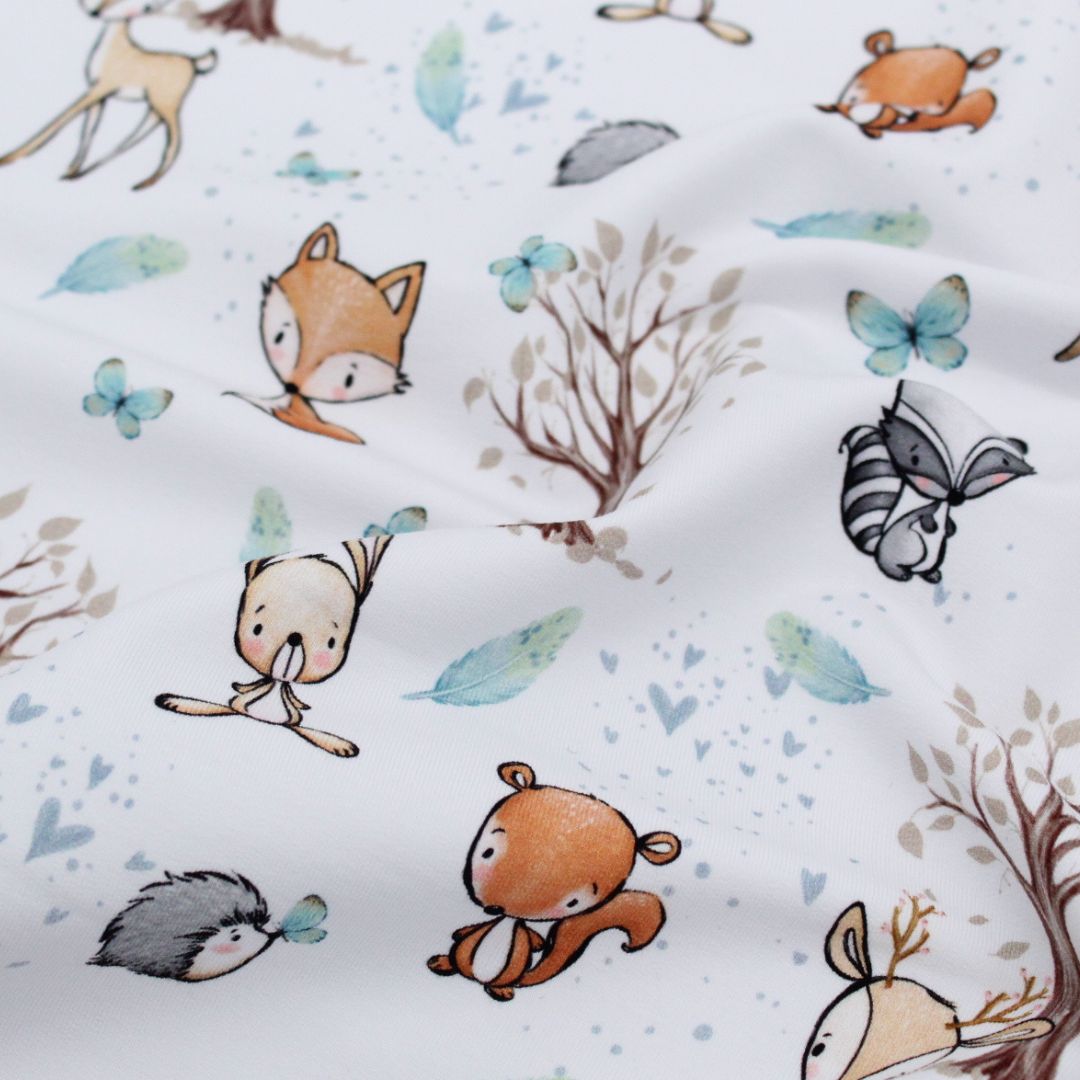 Weicher French Terry "Waldfreunde Frühling" – Niedliche Tiermotive auf weißem Stoff für Kinderkleidung