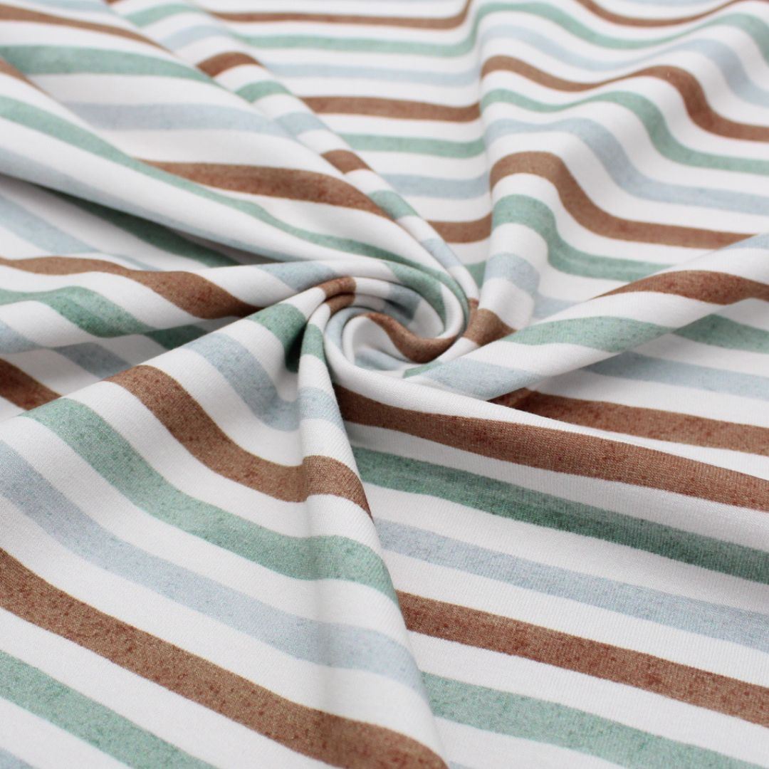 Der Jersey-Stoff mit gezeichneten Streifen in braun und mint, geeignet für Shirts, Kleider und Leggings.