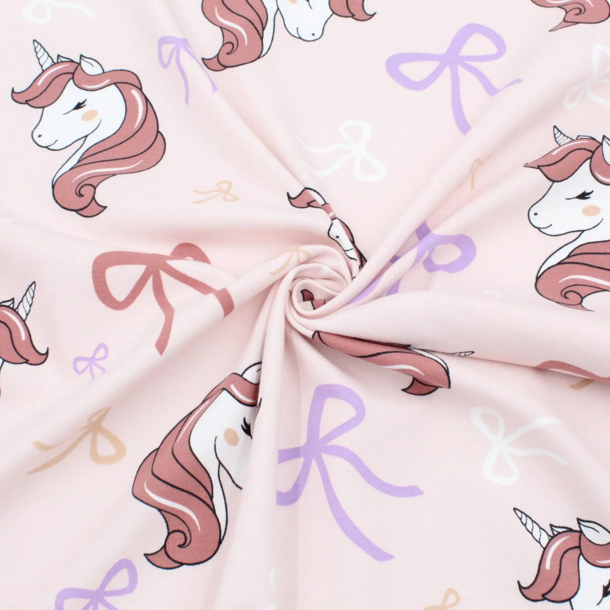Stoff mit Einhörnern und Schleifen rosa Kinderstoff Jersey Meterware