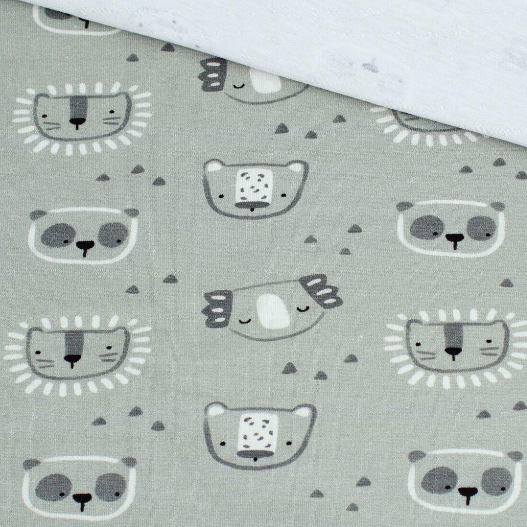 Detailansicht des Motivs: Koala & Panda auf frischem grünem Jersey-Stoff