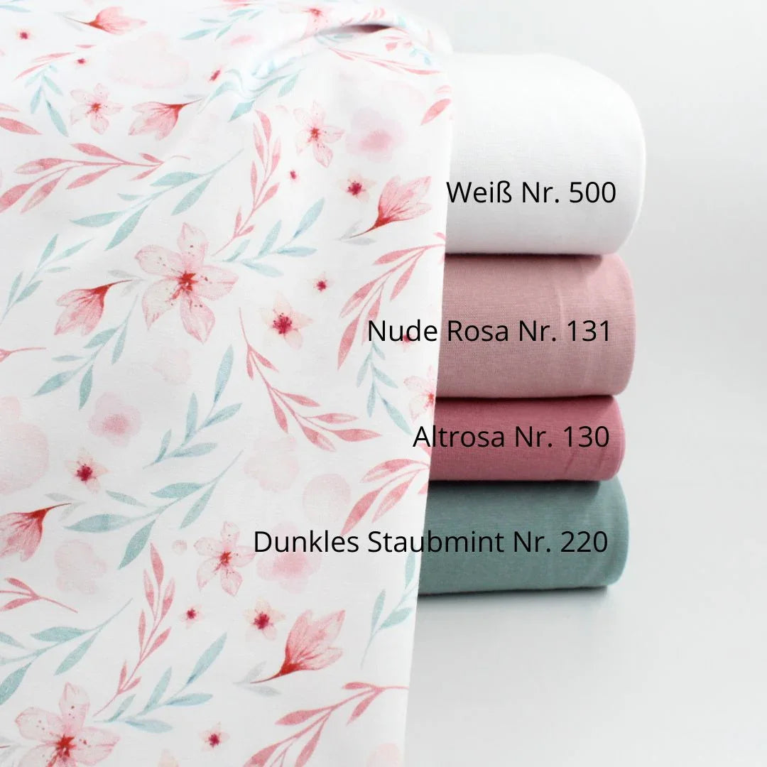 Elastischer Jersey mit zartem Blumendesign in Zartrosa und Hellblau – perfekter Stoff für T-Shirts und Leggings kombiniert mit verschiedene Bündchenstoffe