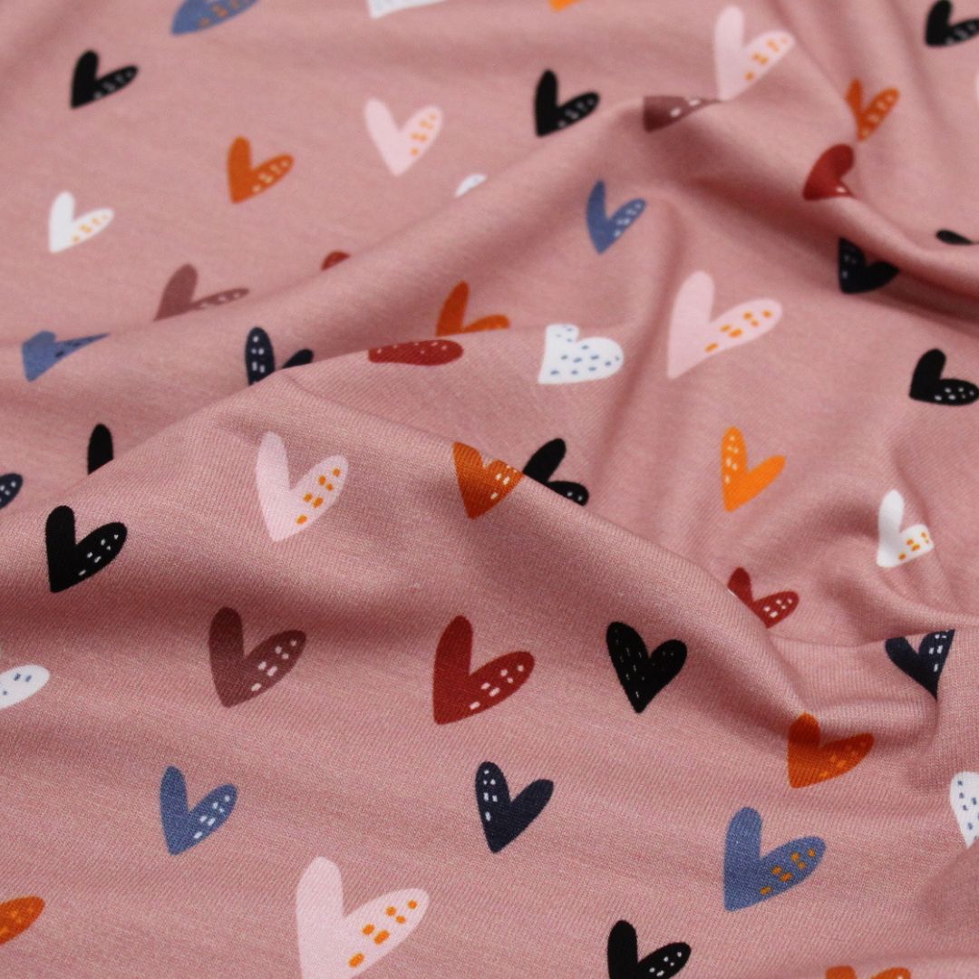 Weicher Jersey bunte Herzen auf Rosa