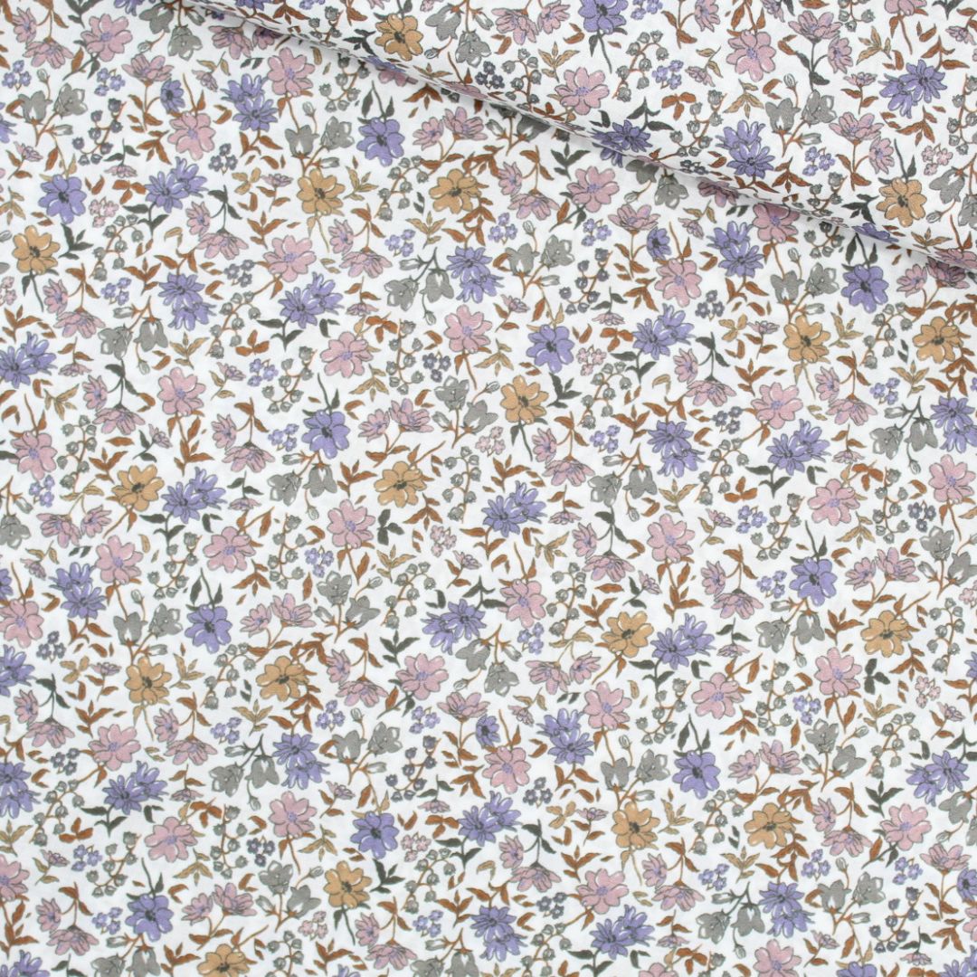 Leichter Voile-Baumwollstoff mit nostalgischen Vintage Blumen, ideal für romantische Blusen und Kleider – transparent und angenehm auf der Haut. Stoffball