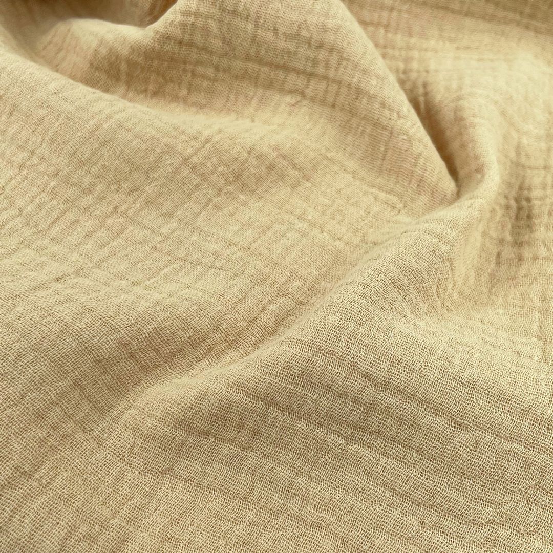 Musselin Stoff in Gelbbeige