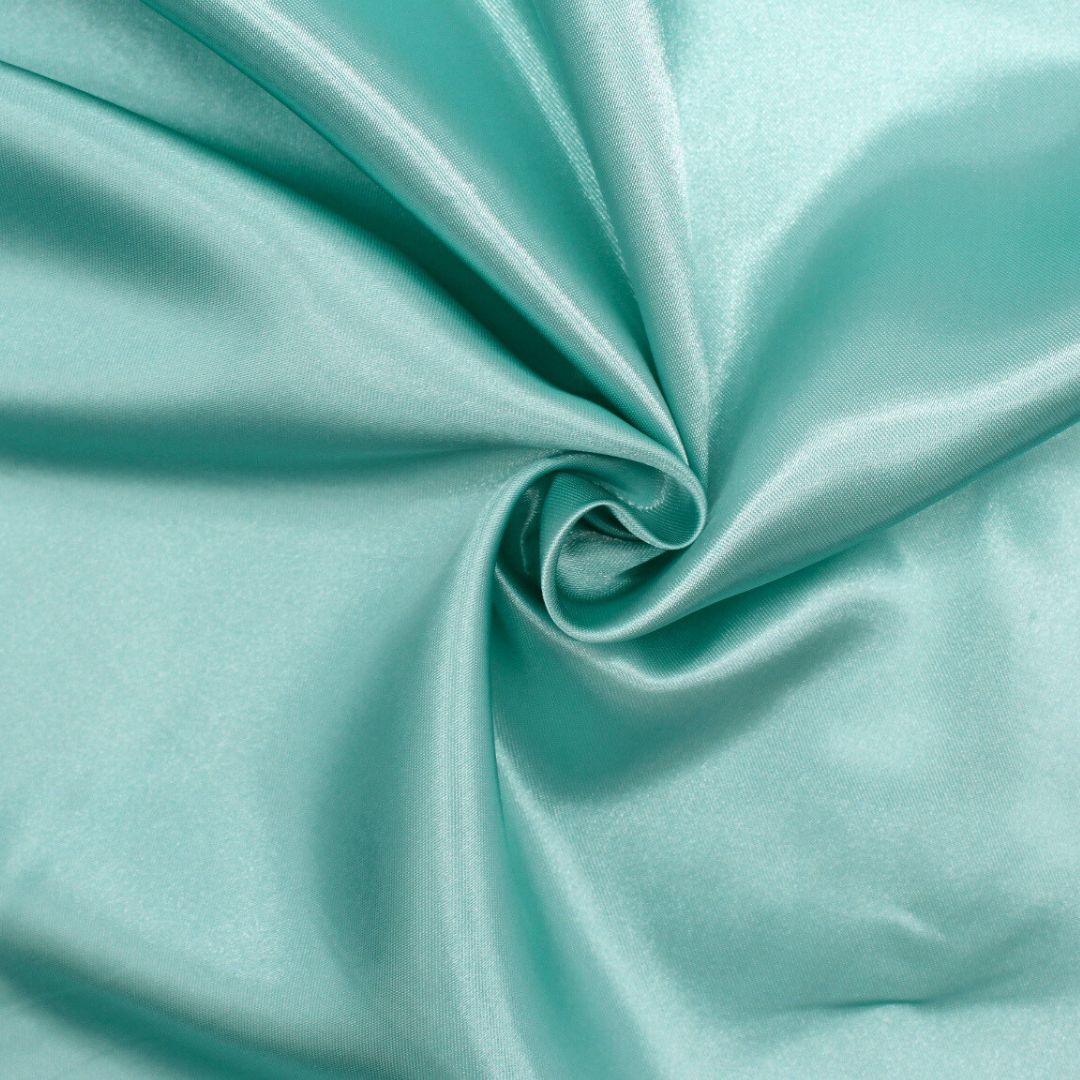 Glatter und weicher Satin-Stoff, perfekt kombiniert mit Tüll- und Spitzenstoffen für elegante Projekte.