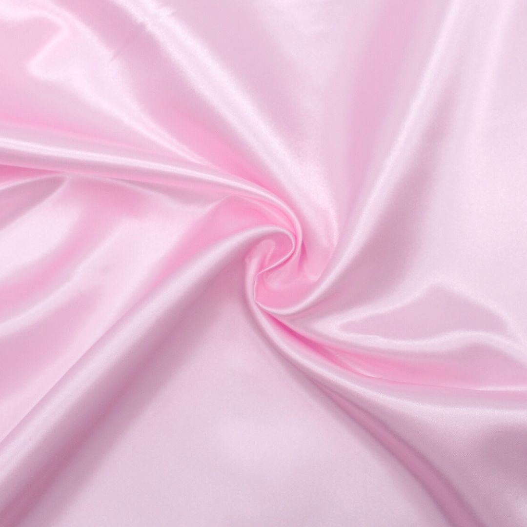 Glatter und weicher Satin-Stoff, perfekt kombiniert mit Tüll- und Spitzenstoffen für elegante Projekte. Hellrosa