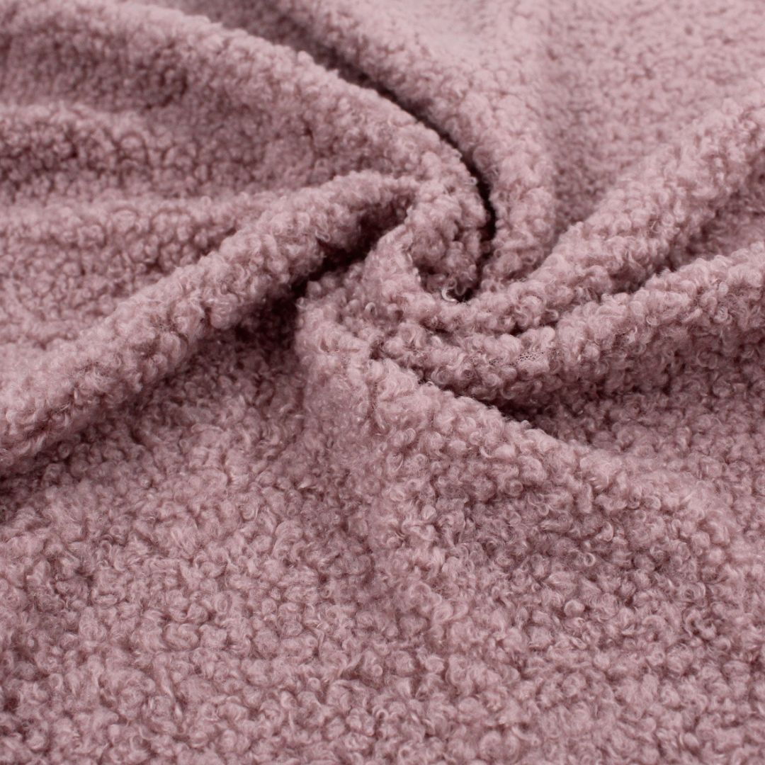 Nahaufnahme Strickboucle in Altrosa