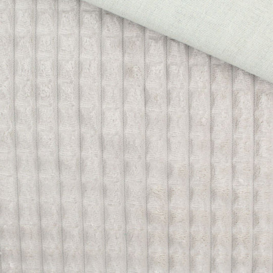 Nahaufnahme vom Velour Polsterstoff in Sand mit Quadratten-Muster