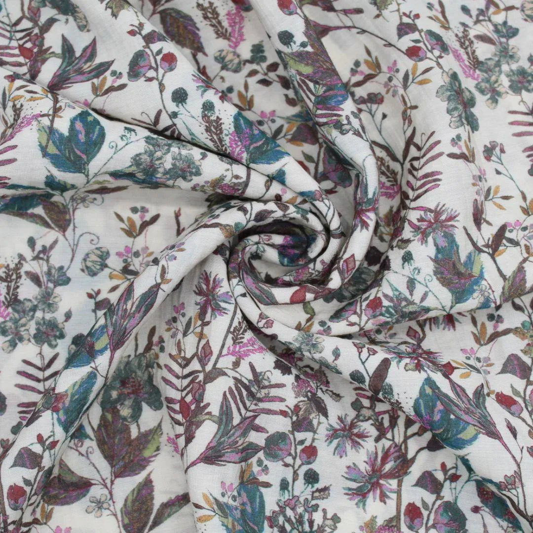 Weicher Viskosestoff "Blumenfeld" in lila und grün mit Blumenmuster, ideal für die Herstellung von Kleidern, Blusen und Röcken.