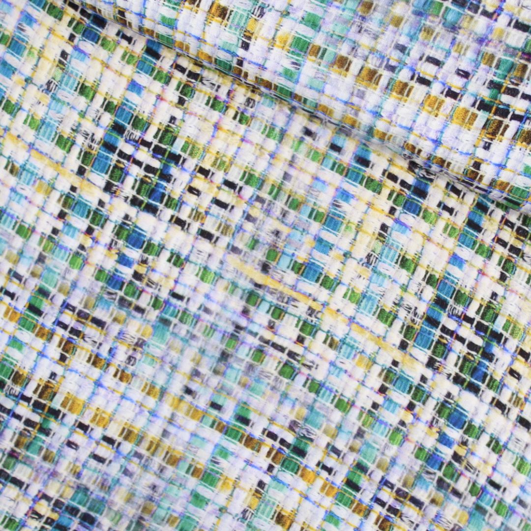 Viskosestoff mit digitaler Grafik aus kleinen Quadraten in Blau, Gelb und Türkisblau, ideal für trendige Kleider, Blusen und Röcke. Stoffball