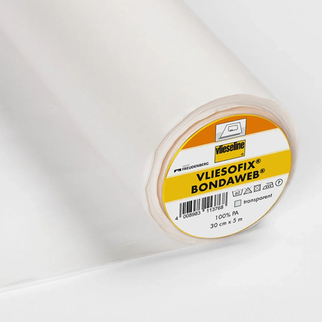 Vliesofix doppelseitiges Bügelvlies in der Verpackung, zeigt das Produkt in der Originalverpackung.