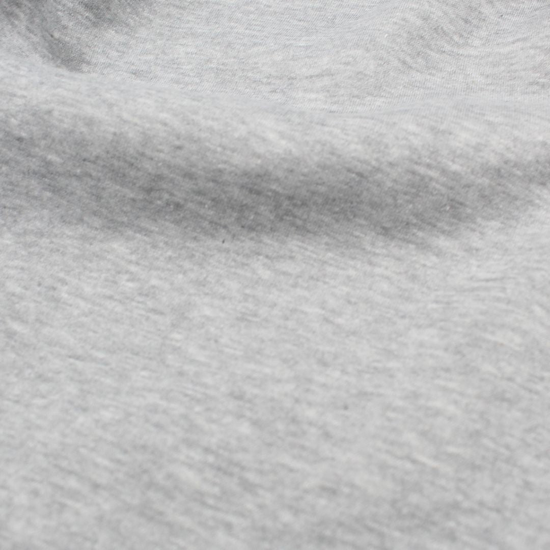 Wintersweat Heavy Jogging Stoff in Grau meliert, ideal für die Herstellung von Hoodies und Loungewear.