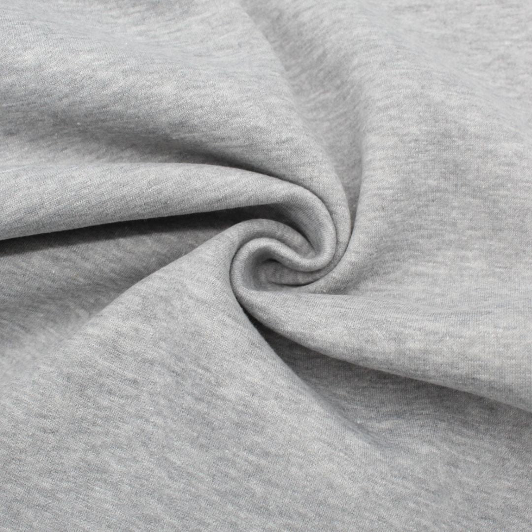 Wintersweat Heavy Jogging Stoff in Grau meliert, ideal für die Herstellung von Hoodies und Loungewear.
