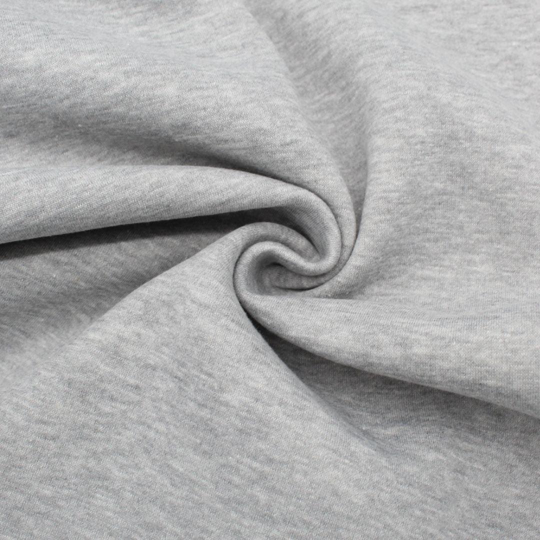 Wintersweat Heavy Jogging Stoff in Grau meliert, ideal für die Herstellung von Hoodies und Loungewear.