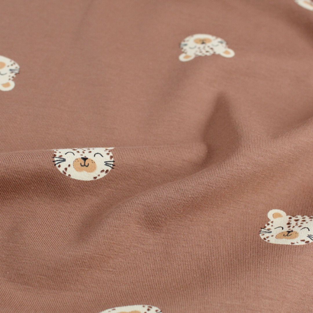 Jersey Stoff Leoparden Gesichter | Braun - Stofftime