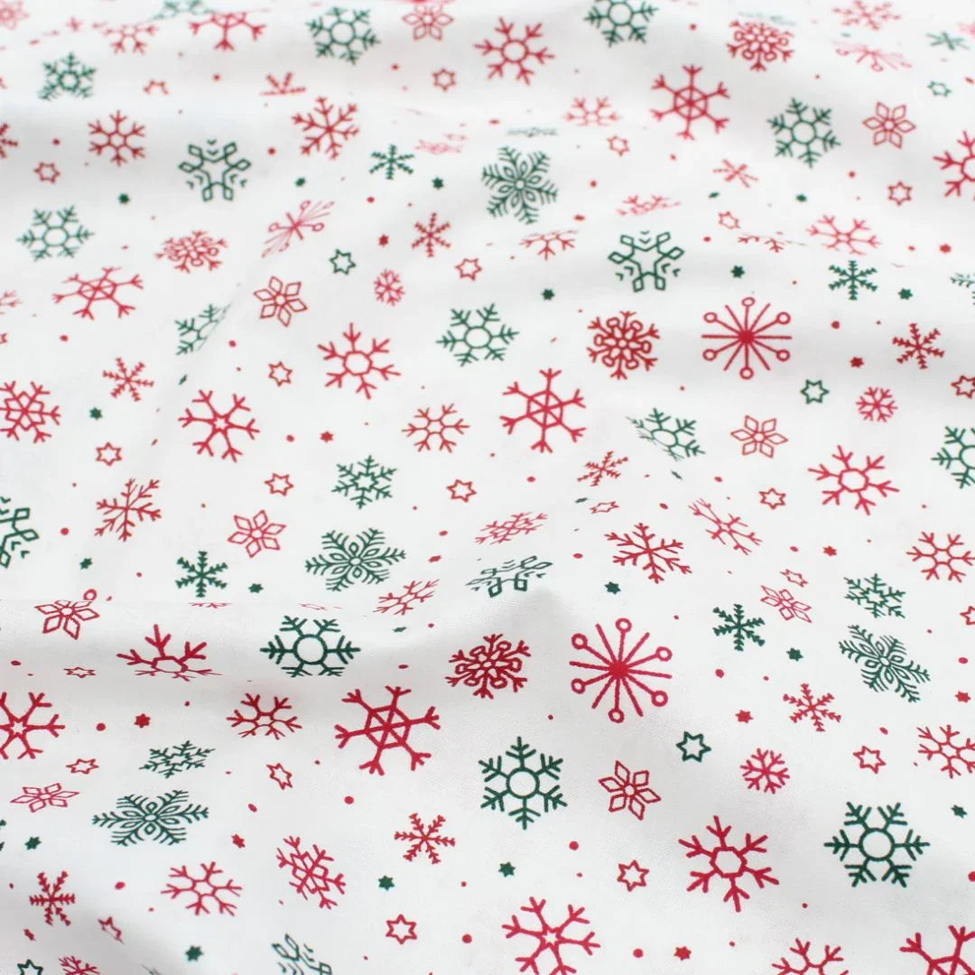 Popeline Stoff Weihnachtsstoff Schneeflocken und Sterne - Stofftime
