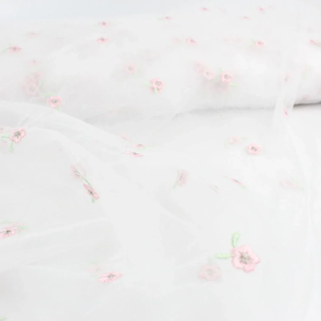 Tüllstoff mit gestickten rosa Blumen - Stofftime