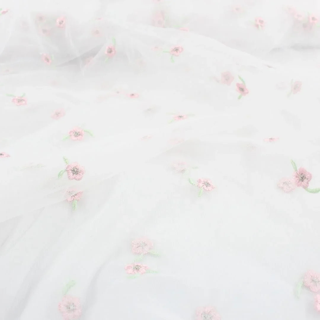 Tüllstoff mit gestickten rosa Blumen - Stofftime