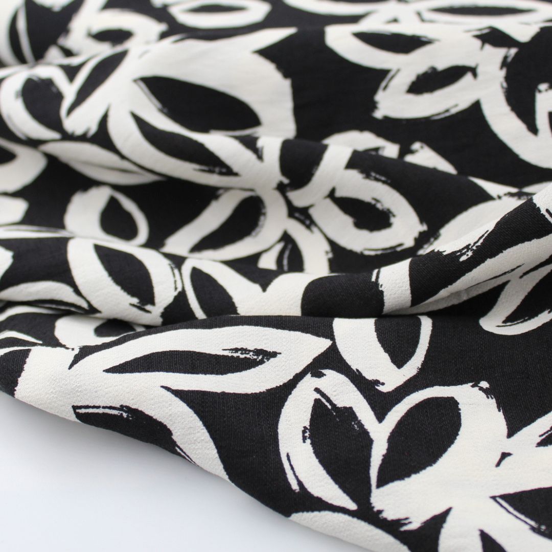 Viskose Nylon Weiße Blumen | Schwarz - Stofftime