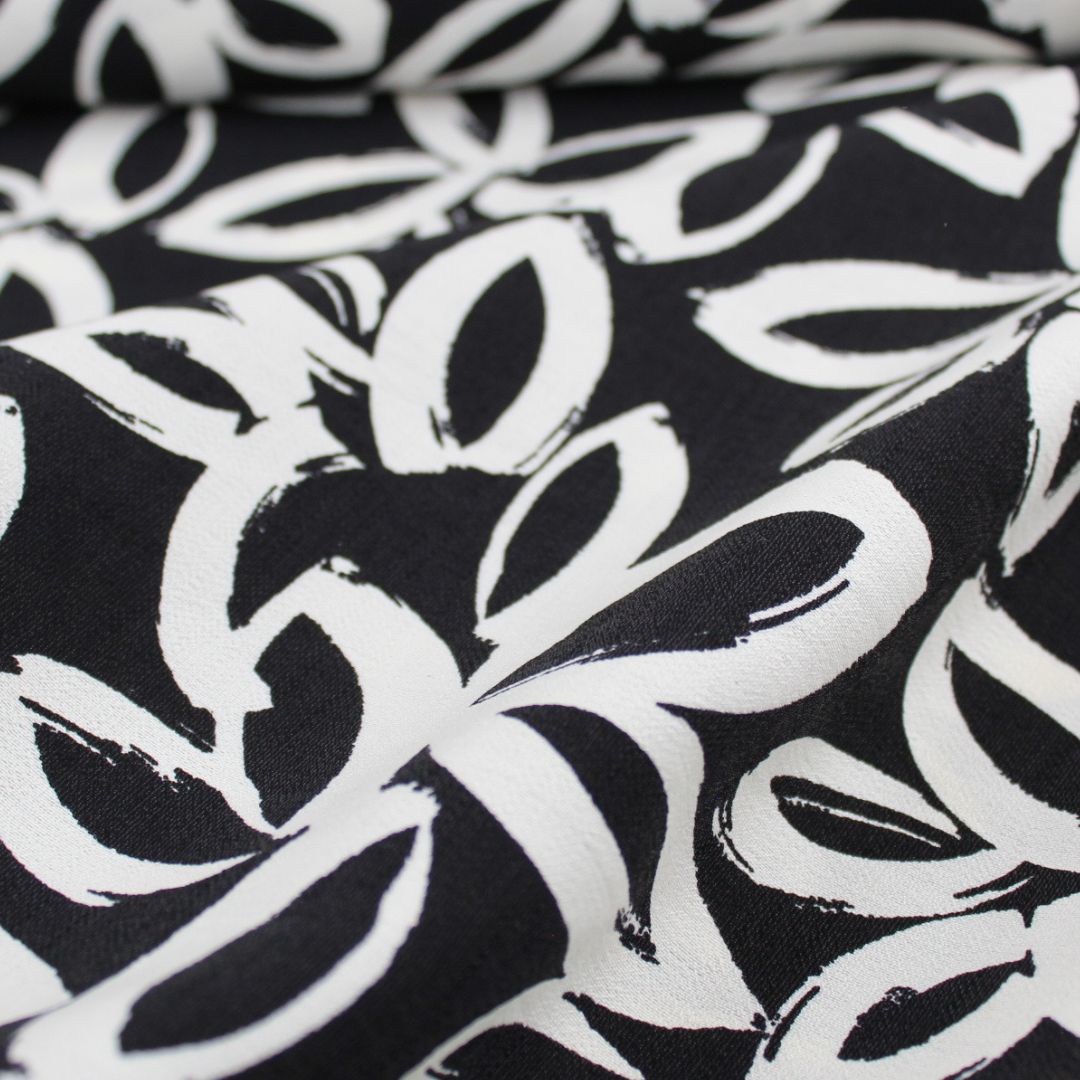 Viskose Nylon Weiße Blumen | Schwarz - Stofftime