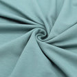 Detailansicht des nicht angerauten French Terry-Stoffs, ideal für die Herstellung von Sweatshirts und Freizeitkleidung.