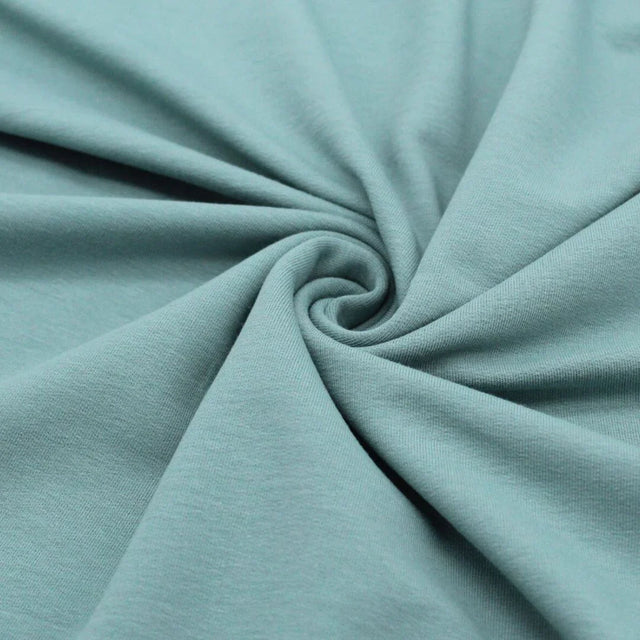Detailansicht des nicht angerauten French Terry-Stoffs, ideal für die Herstellung von Sweatshirts und Freizeitkleidung.