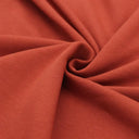 Detailansicht des nicht angerauten French Terry-Stoffs, ideal für die Herstellung von Sweatshirts und Freizeitkleidung.