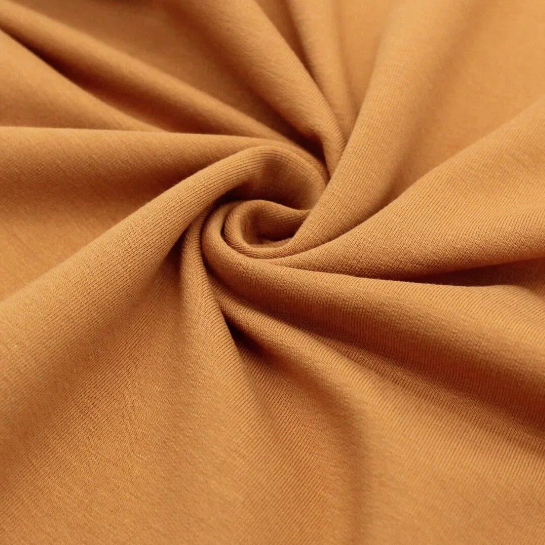 Detailansicht des nicht angerauten French Terry-Stoffs, ideal für die Herstellung von Sweatshirts und Freizeitkleidung.