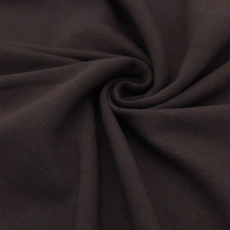 Detailansicht des nicht angerauten French Terry-Stoffs, ideal für die Herstellung von Sweatshirts und Freizeitkleidung.