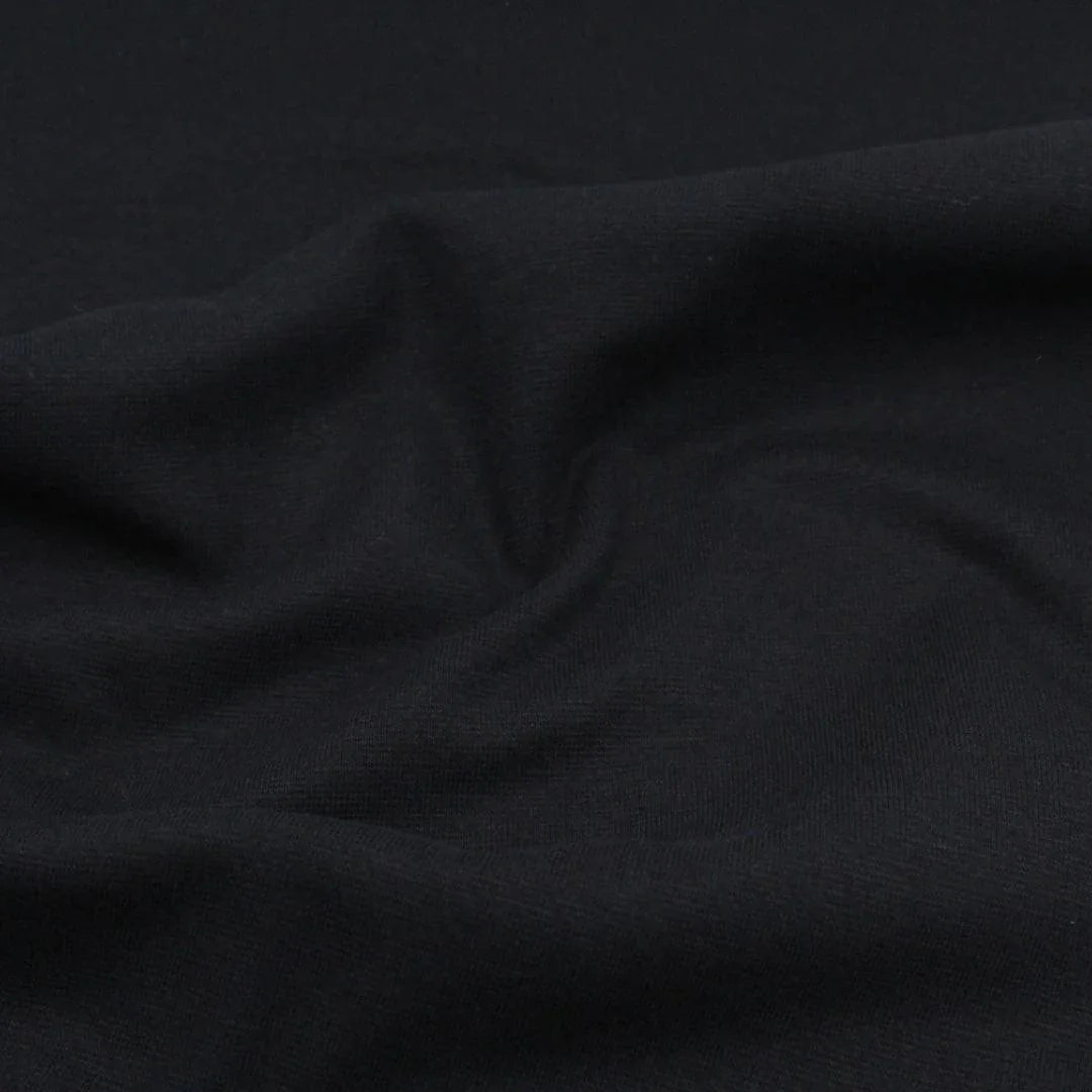 Bündchenstoff in Schwarz – Elastisch, weich und langlebig, perfekt für Nähprojekte wie Pumphosen, Strampler und Pullover.