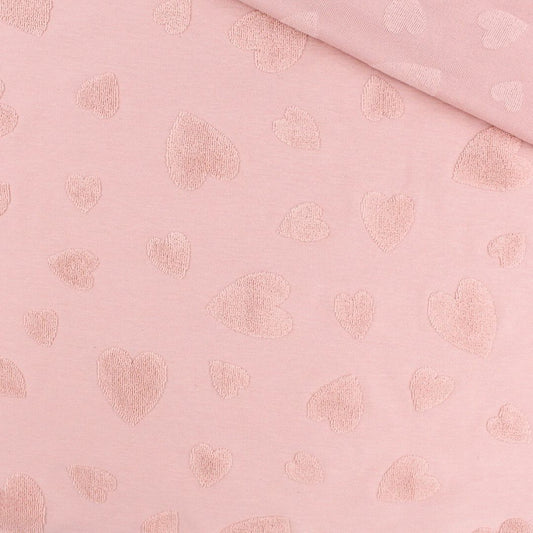 Baumwoll-Jacquard Stoff mit Frottee-Herzen in Puderrosa, Nahaufnahme der Struktur