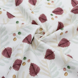 Baumwollstoff mit herbstlichem Blätter-Design in warmen Farben | Nahaufnahme