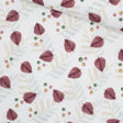Baumwollstoff mit herbstlichem Blätter-Design in warmen Farben