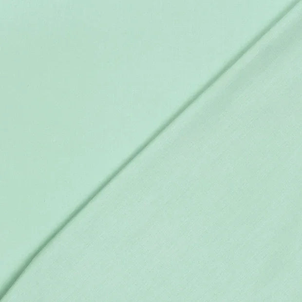 Detailansicht der Baumwolle Meterware Fahnentuch Premium Mint mit feiner, gleichmäßiger Webstruktur, matte Optik und angenehme Haptik für vielseitige DIY- und Bekleidungsprojekte.