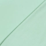 Detailansicht der Baumwolle Meterware Fahnentuch Premium Mint mit feiner, gleichmäßiger Webstruktur, matte Optik und angenehme Haptik für vielseitige DIY- und Bekleidungsprojekte.