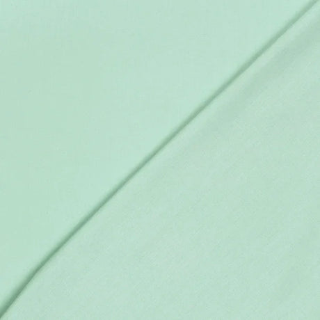 Detailansicht der Baumwolle Meterware Fahnentuch Premium Mint mit feiner, gleichmäßiger Webstruktur, matte Optik und angenehme Haptik für vielseitige DIY- und Bekleidungsprojekte.