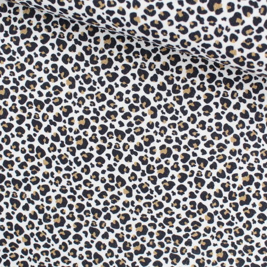 Feincord Stoff Leopardenmuster auf Weiß – Baumwollcord 140 cm Breite