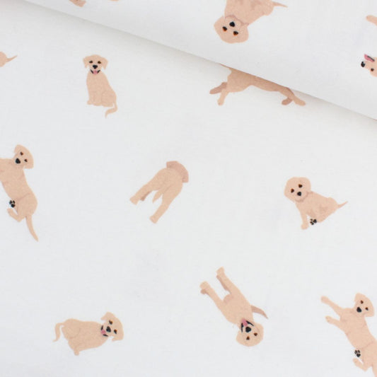 Flanellstoff mit Hunde-Muster auf ecrufarbenem Hintergrund – weiche Baumwolle, ideal für Kleidung