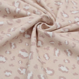 Jersey Stoff mit Leopardenmuster auf Sand