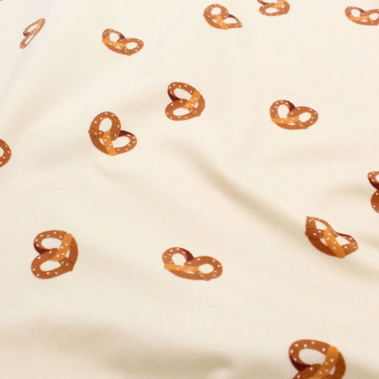 Jersey Stoff Brezel Beige