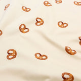 Jersey Stoff Brezel Beige