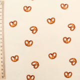 Jersey Stoff Brezel Beige