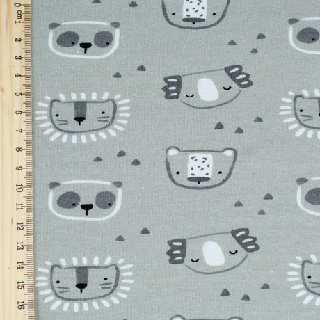 Jersey-Stoff mit niedlichen Tiermotiven: Koala, Panda, Leopard und Löwe