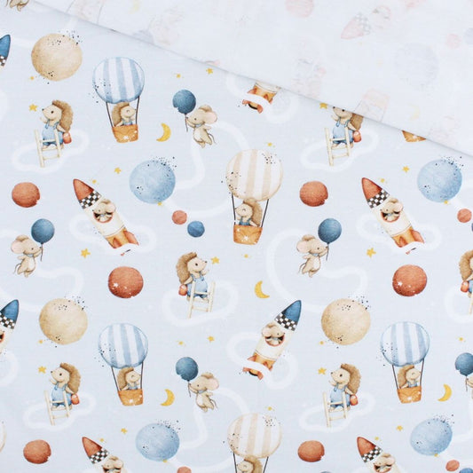 Jersey Stoff Traumreise in Pastellblau mit Tiermotiven, Heißluftballons, Raketen und Sternenhimmel