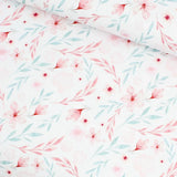 Jersey Stoff Blumenparadies mit zartrosa und blauen Blumen auf weißem Hintergrund – ideal für Baby- und Kinderkleidung